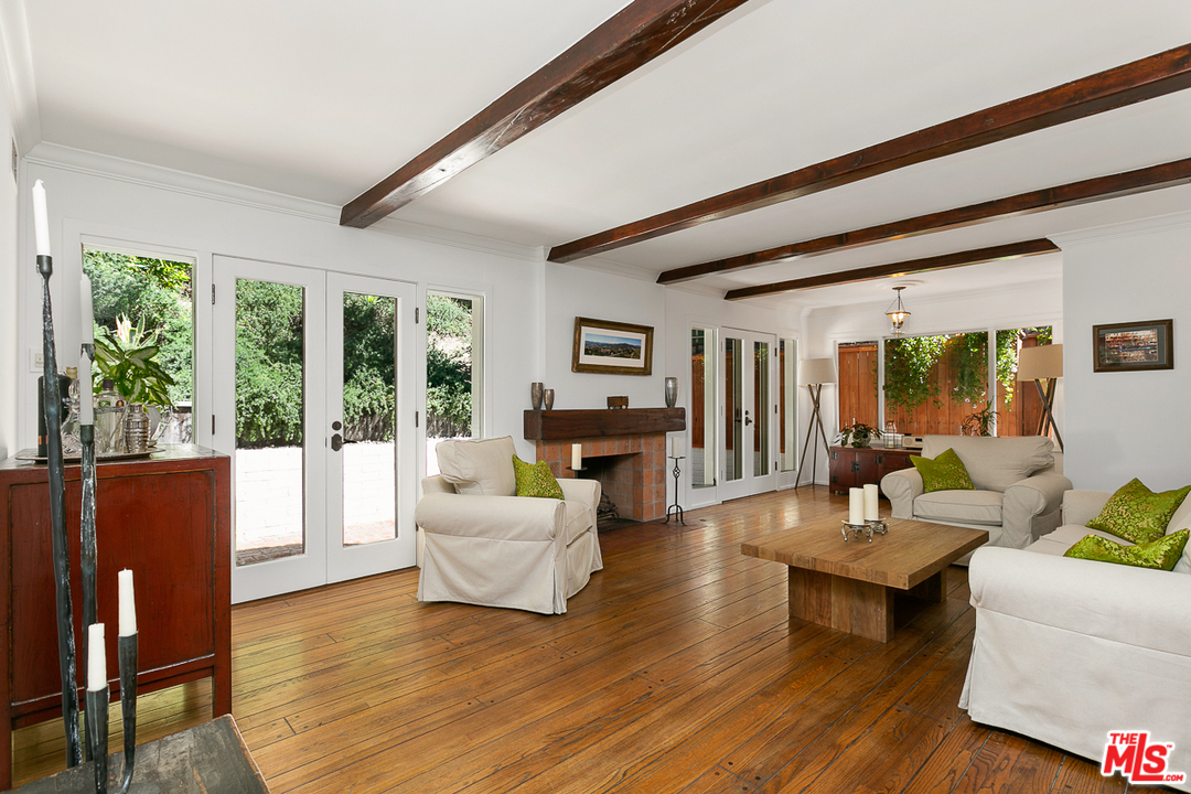 1600 Queens Road Los Angeles, CA 90069 - Photo 8 of 35 a living room with furniture and a large window