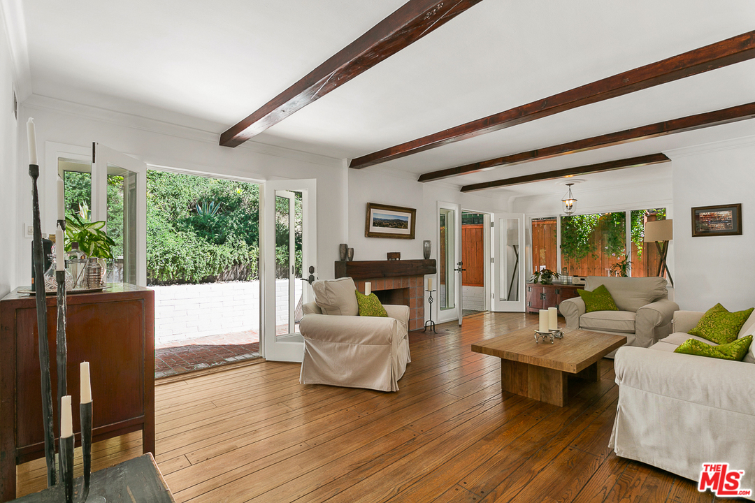 1600 Queens Road Los Angeles, CA 90069 - Photo 9 of 35 a living room with furniture and a large window