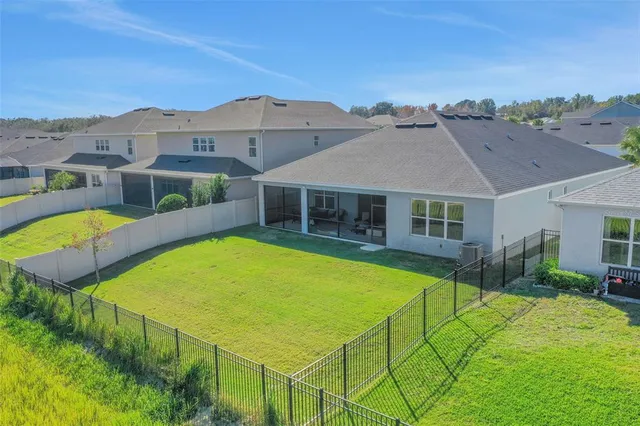 aerial view of a house with a garden