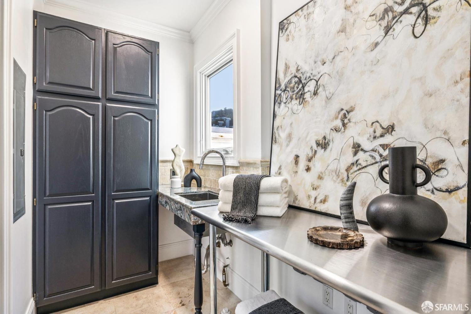 729 Douglass Street San Francisco, CA 94114 - Photo 30 of 79 a kitchen with stainless steel appliances granite countertop a refrigerator and a sink
