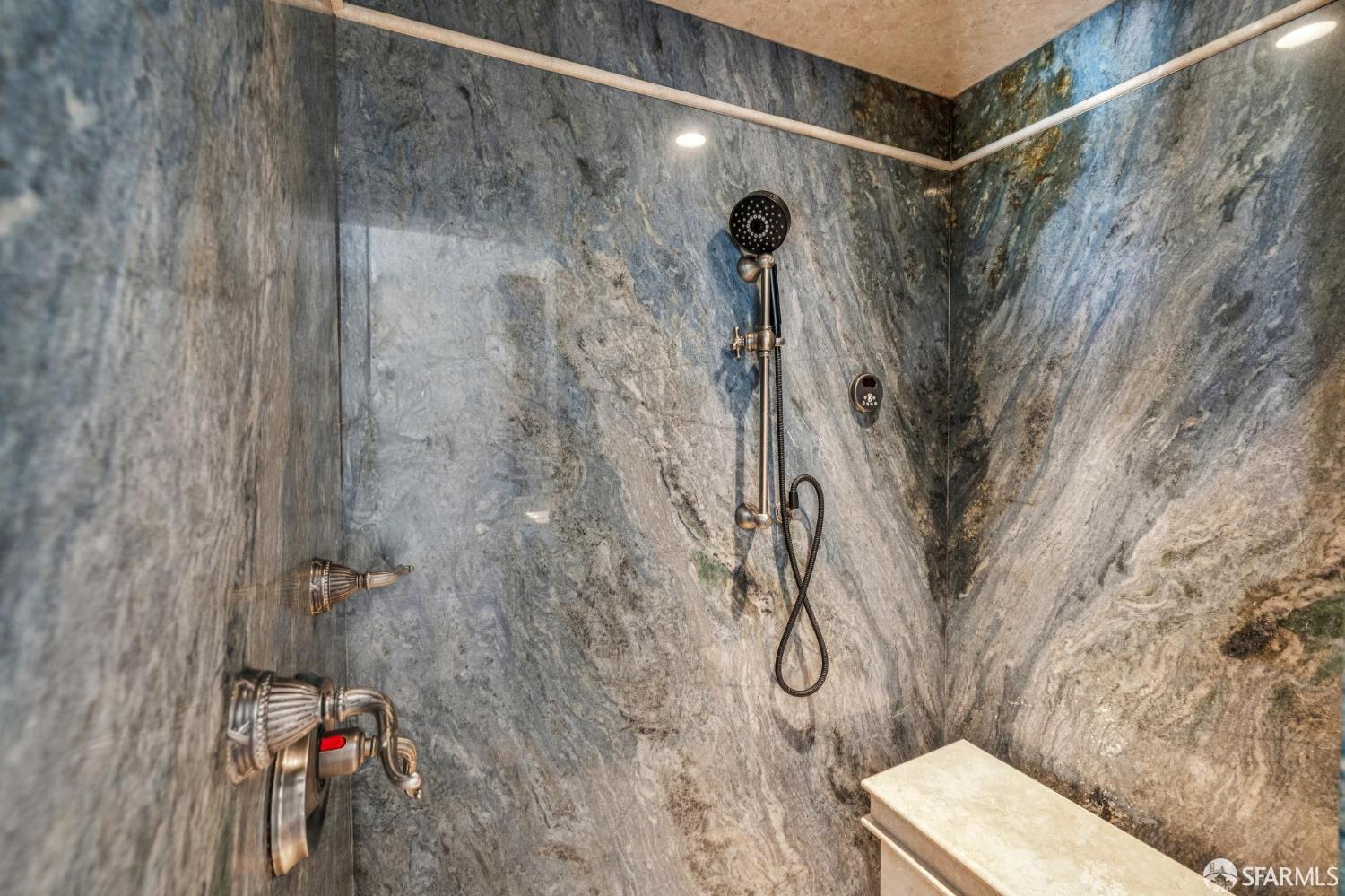 729 Douglass Street San Francisco, CA 94114 - Photo 45 of 79 a bathroom with a shower and a toilet