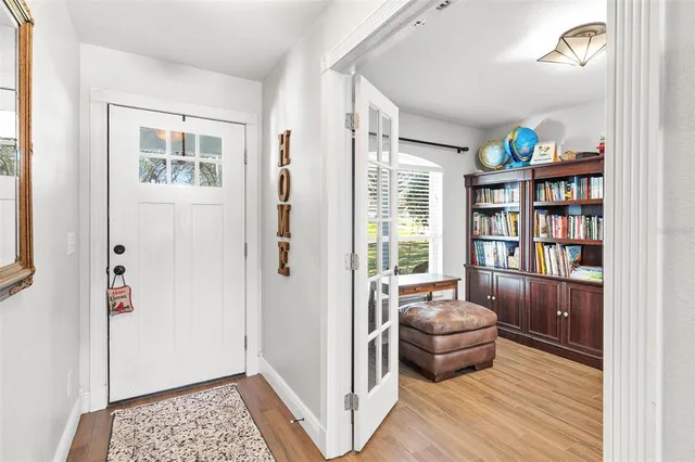 a livingroom with furniture and a window