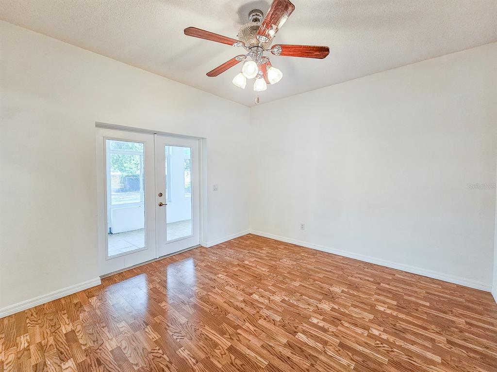 28 Botany Lane Palm Coast, FL 32137 - Photo 17 of 48 wooden floor in an empty room