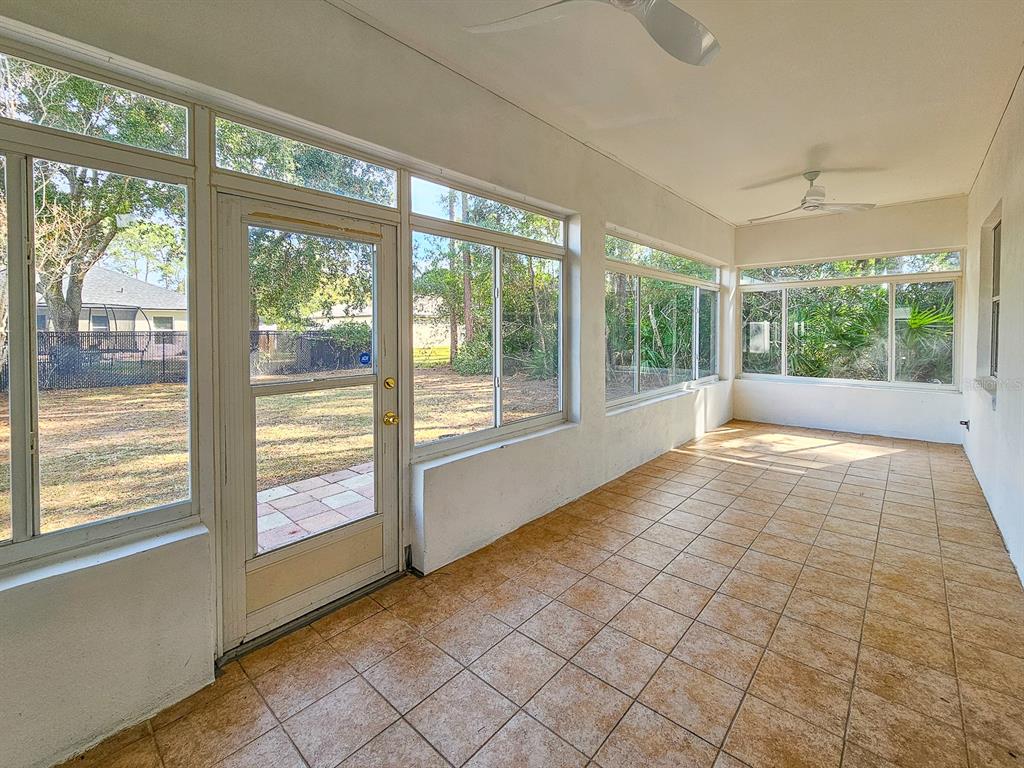 28 Botany Lane Palm Coast, FL 32137 - Photo 19 of 48 a view of empty room with windows