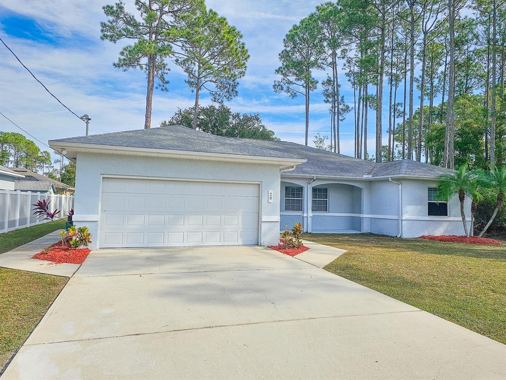 28 Botany Lane Palm Coast, FL 32137 - Photo 2 of 48 a view of a house with basketball court