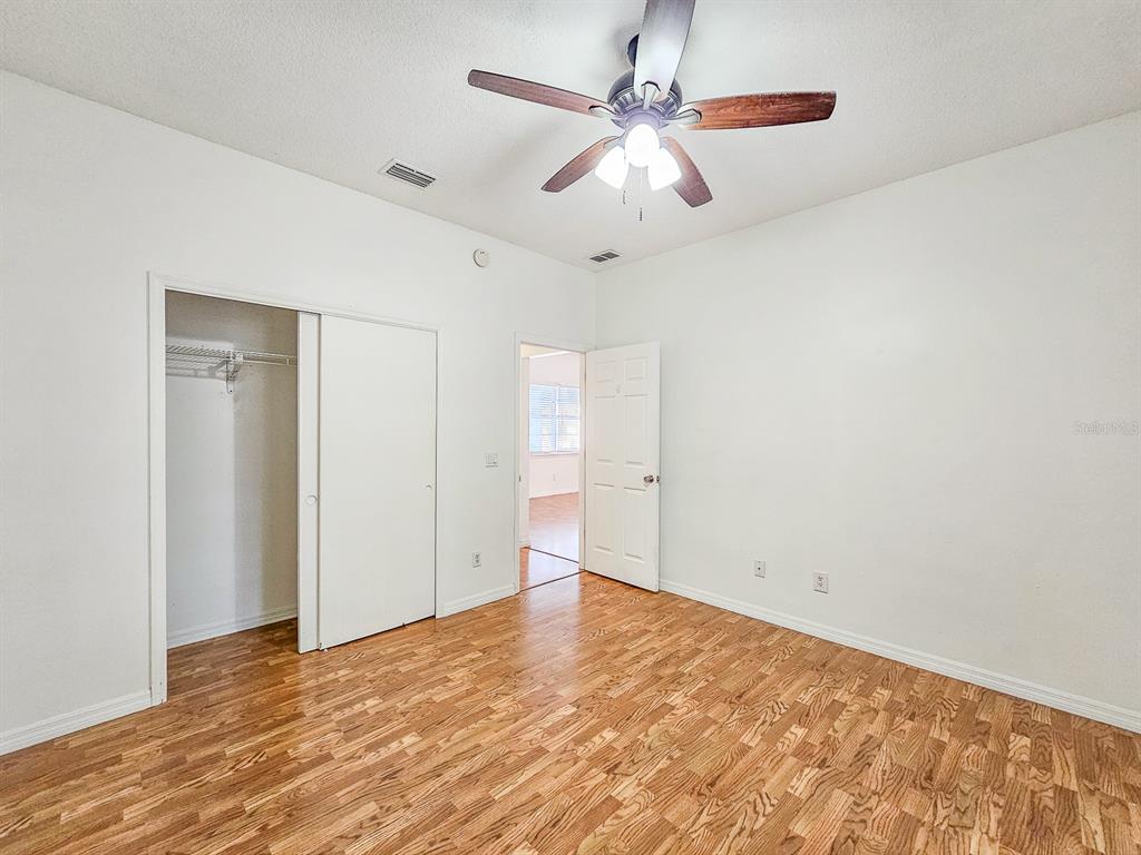 28 Botany Lane Palm Coast, FL 32137 - Photo 36 of 48 wooden floor in an empty room