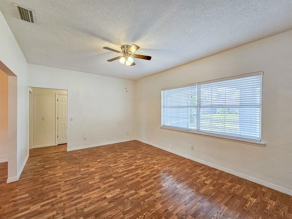 28 Botany Lane Palm Coast, FL 32137 - Photo 6 of 48 a view of an empty room with a window