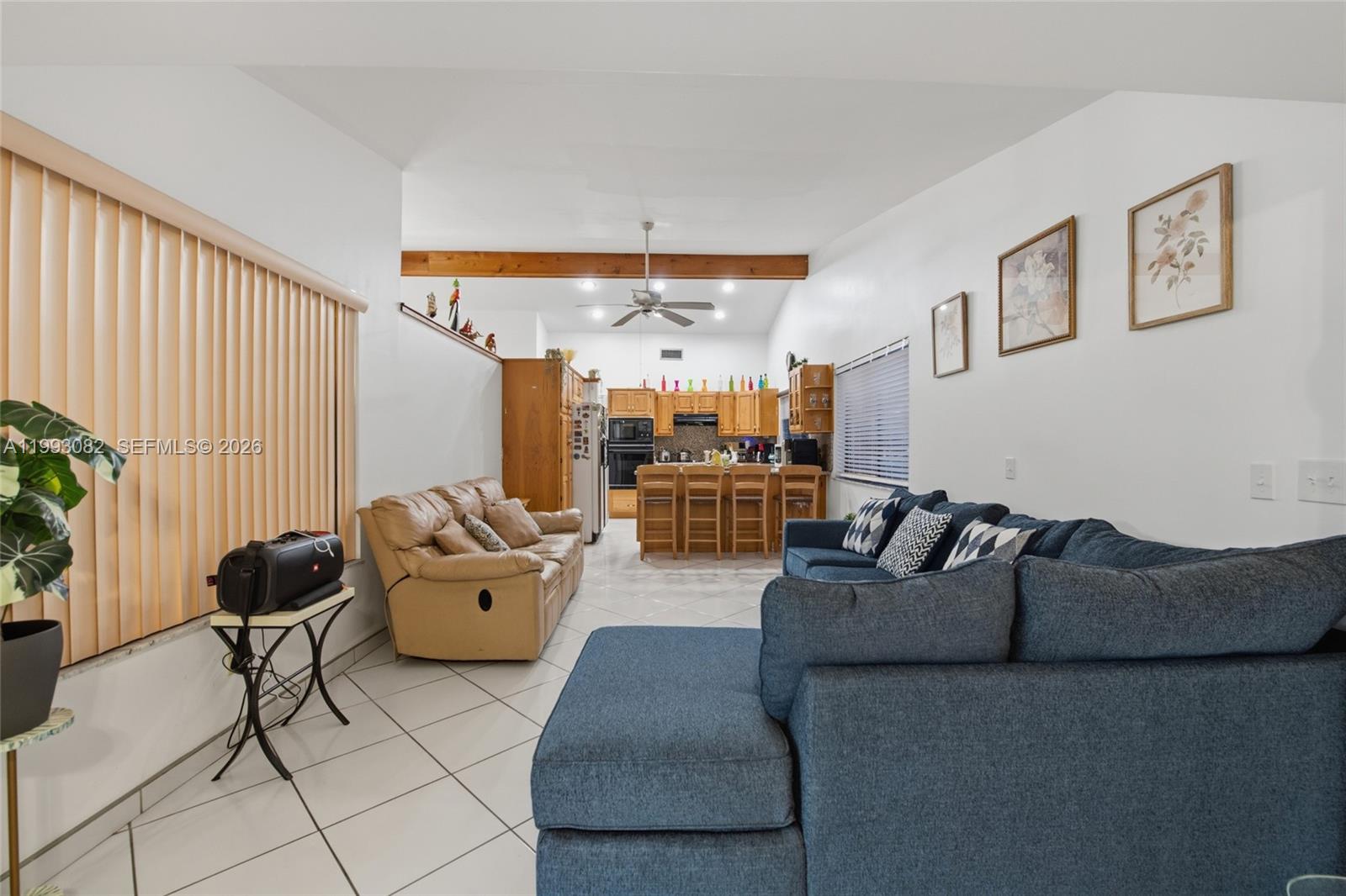 12702 Southwest 113th Lane Miami, FL 33186 - Photo 14 of 29 a living room with furniture and a potted plant