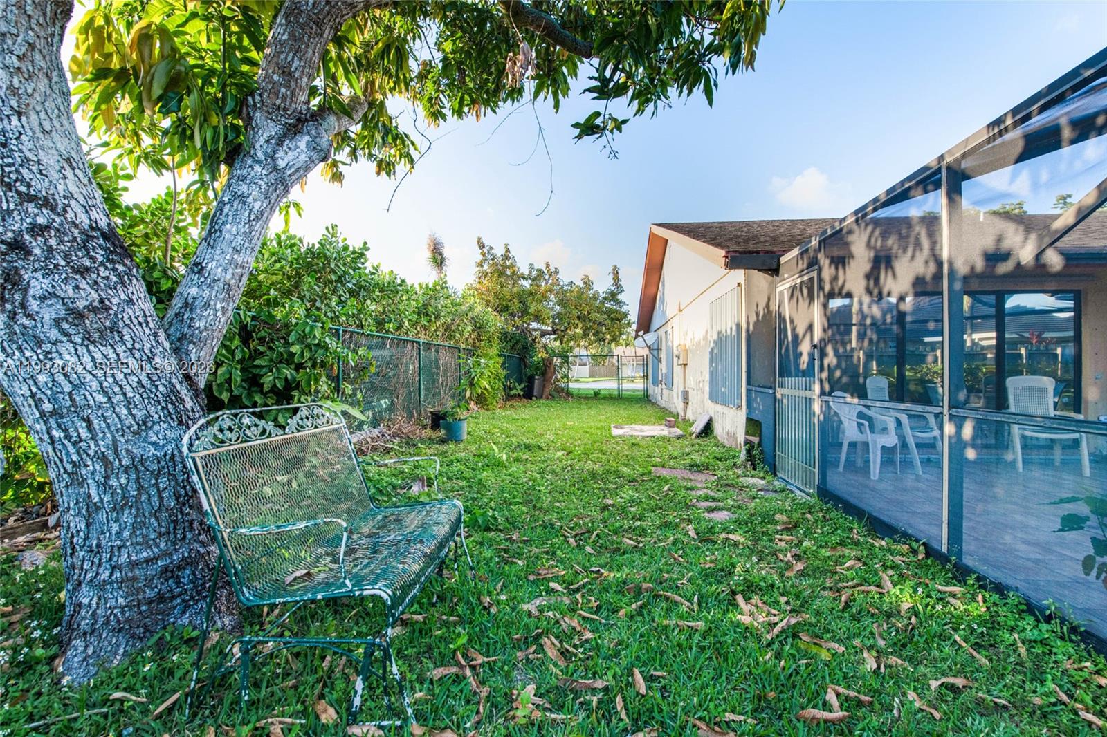 12702 Southwest 113th Lane Miami, FL 33186 - Photo 26 of 29 a view of a backyard with garden