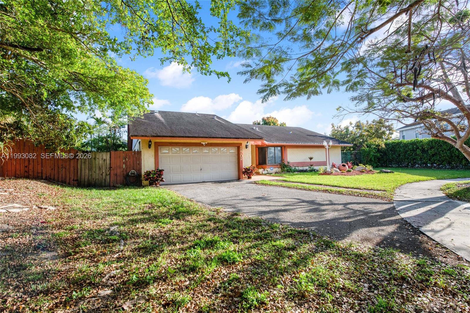 12702 Southwest 113th Lane Miami, FL 33186 - Photo 28 of 29 a view of a house with a yard and tree