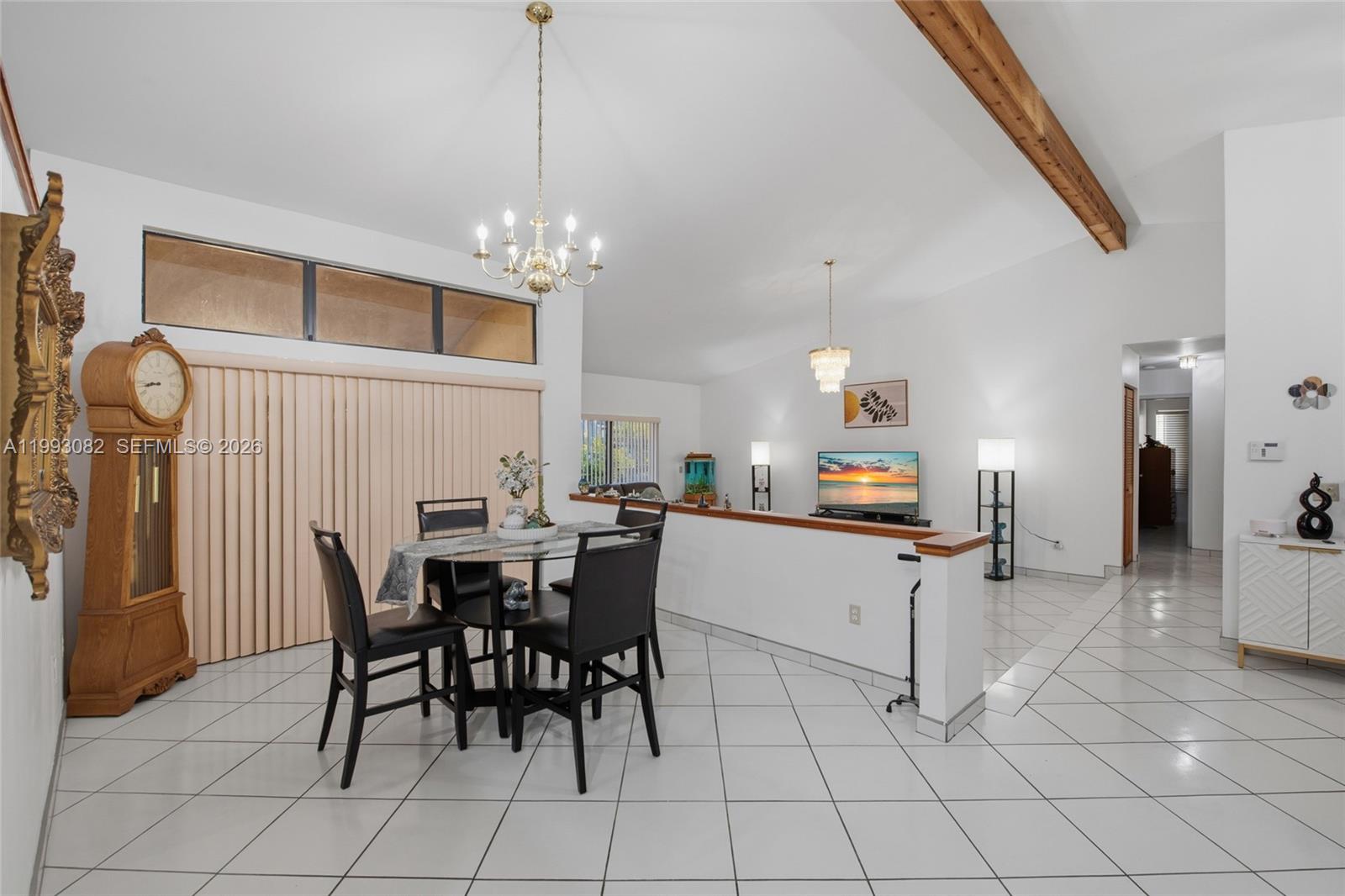 12702 Southwest 113th Lane Miami, FL 33186 - Photo 8 of 29 a view of a dining room with furniture