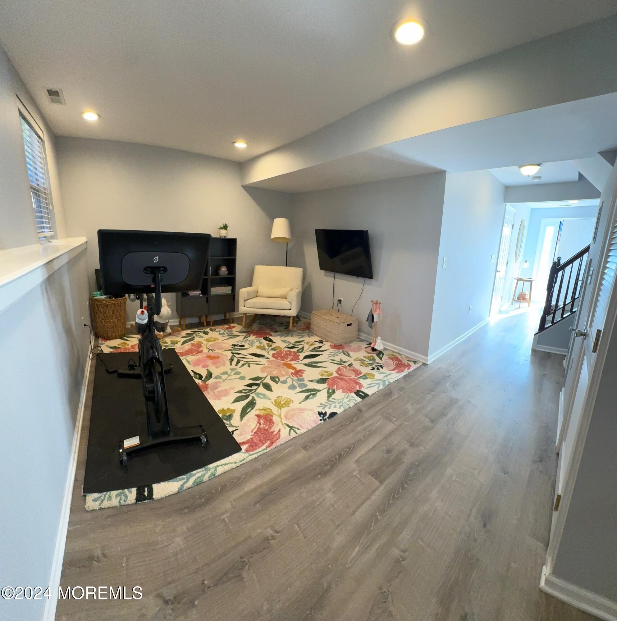 52 Saxton Road Farmingdale, NJ 07727 - Photo 11 of 52 a living room with furniture and a flat screen tv