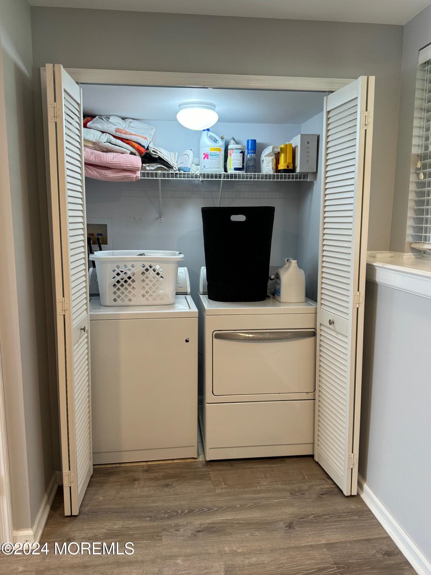 52 Saxton Road Farmingdale, NJ 07727 - Photo 12 of 52 a utility room with dryer and washer