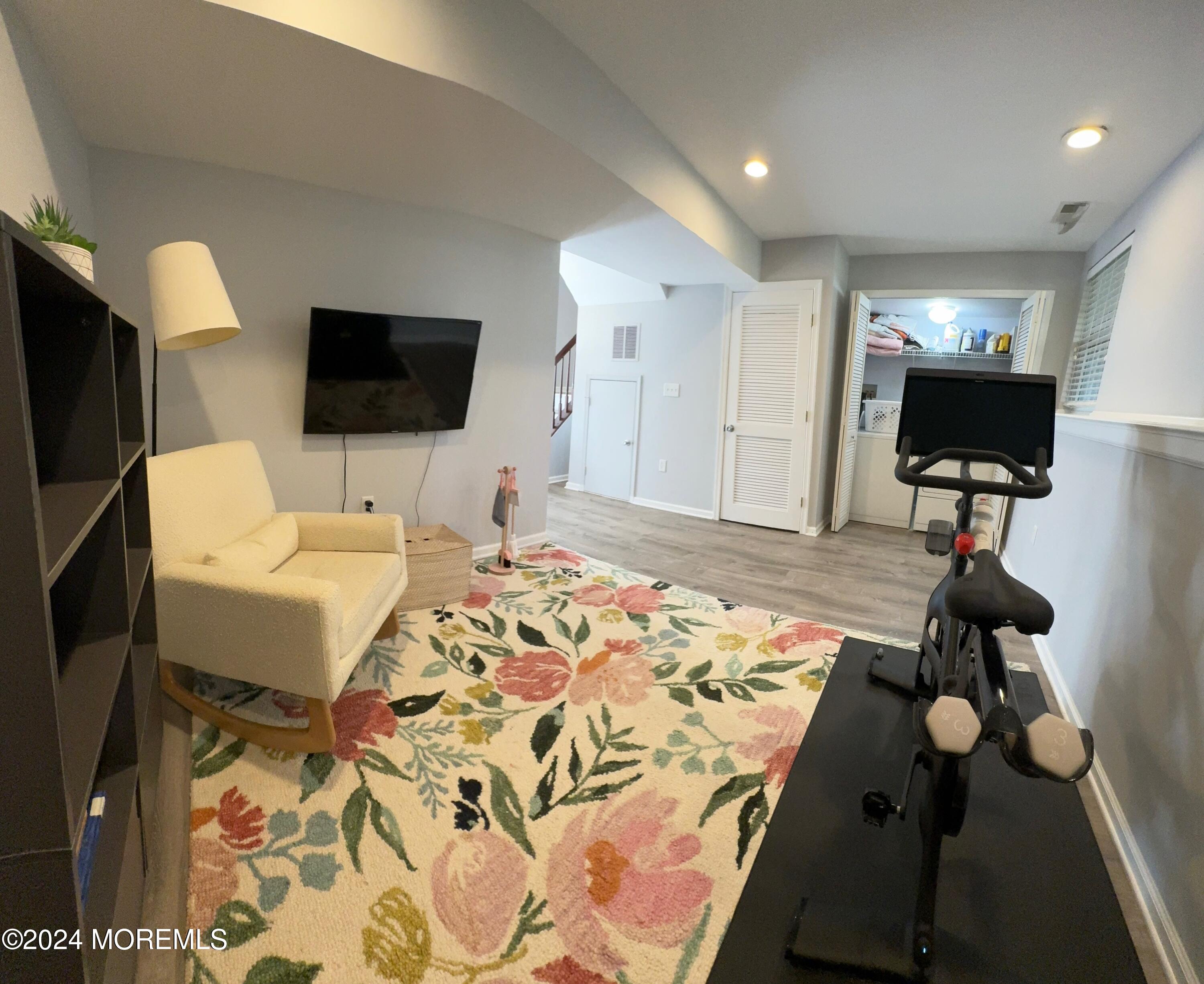 52 Saxton Road Farmingdale, NJ 07727 - Photo 13 of 52 a bedroom with a bed and flat screen tv