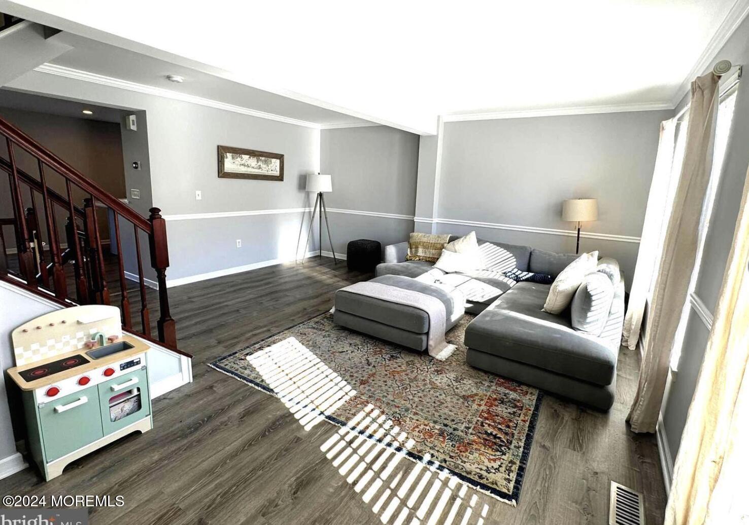 52 Saxton Road Farmingdale, NJ 07727 - Photo 17 of 52 a living room with furniture and a couch