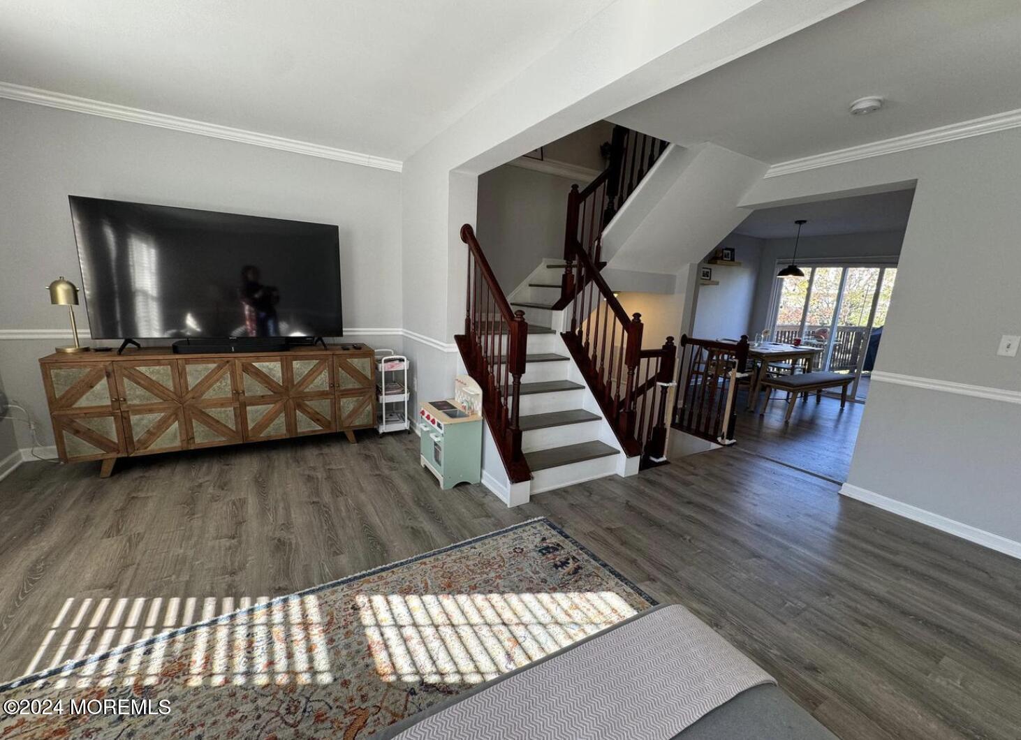 52 Saxton Road Farmingdale, NJ 07727 - Photo 18 of 52 a living room with furniture and a wooden floor
