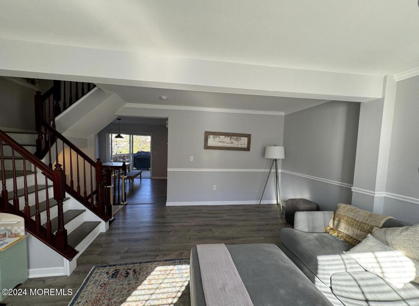 52 Saxton Road Farmingdale, NJ 07727 - Photo 19 of 52 a living room with furniture and a rug