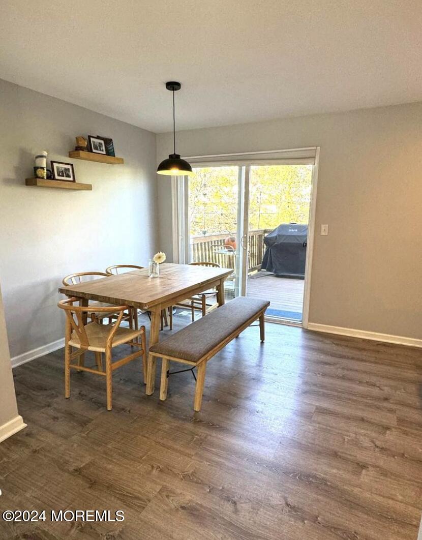 52 Saxton Road Farmingdale, NJ 07727 - Photo 21 of 52 a dining room with furniture window and wooden floor
