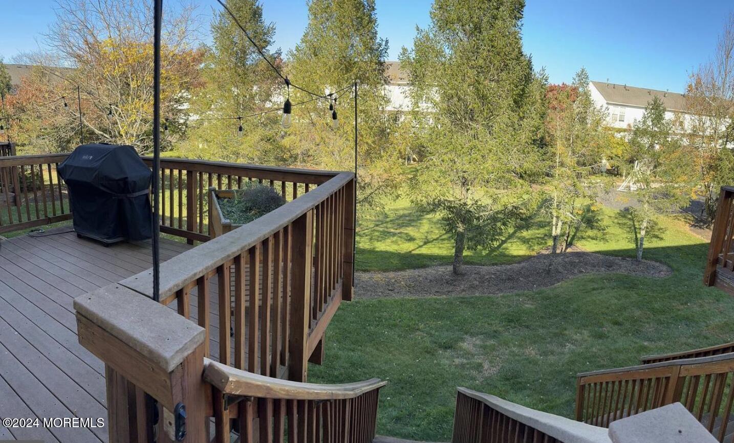 52 Saxton Road Farmingdale, NJ 07727 - Photo 26 of 52 a view of a balcony with chair