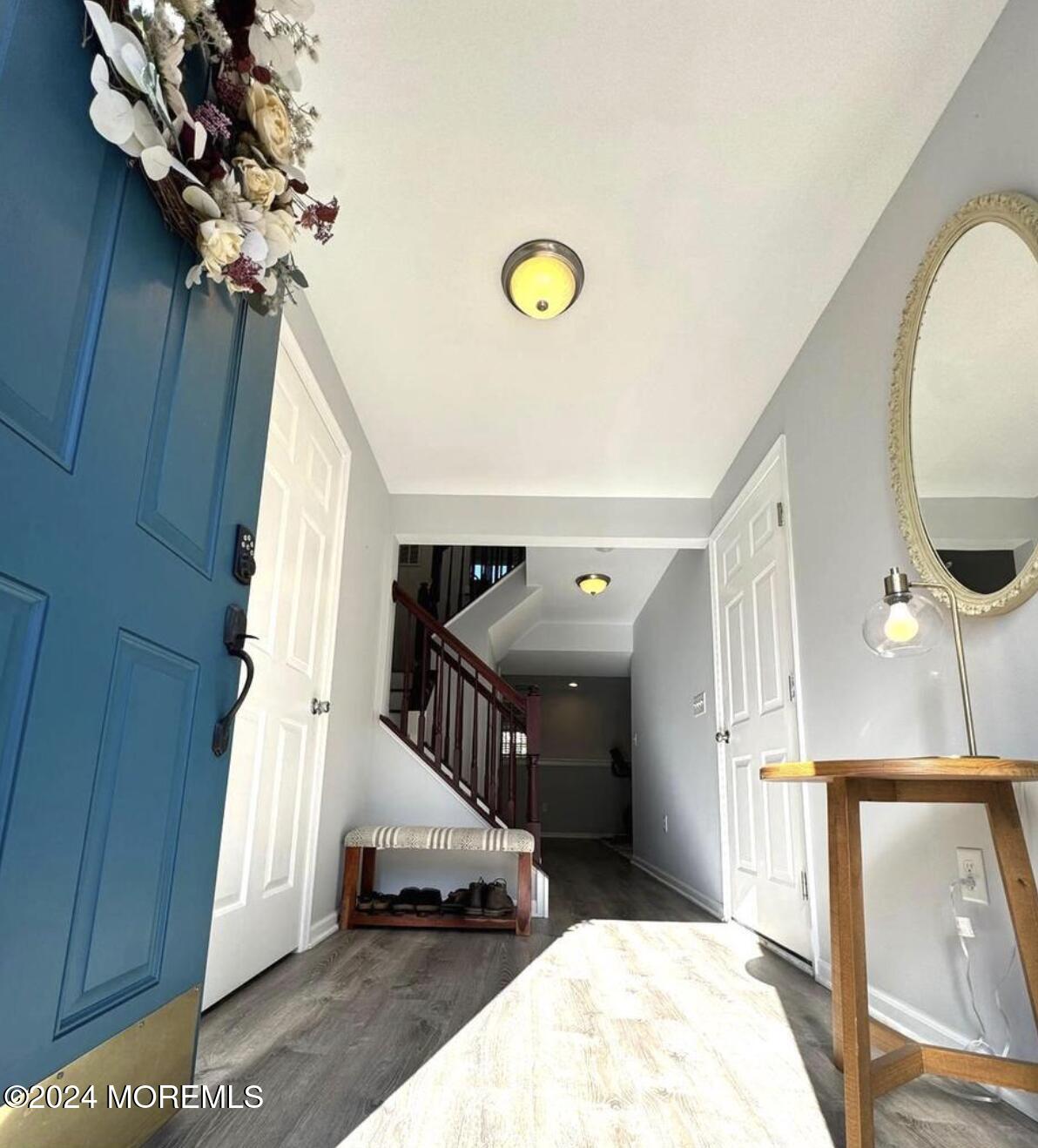 52 Saxton Road Farmingdale, NJ 07727 - Photo 3 of 52 a view of a livingroom with furniture and entryway