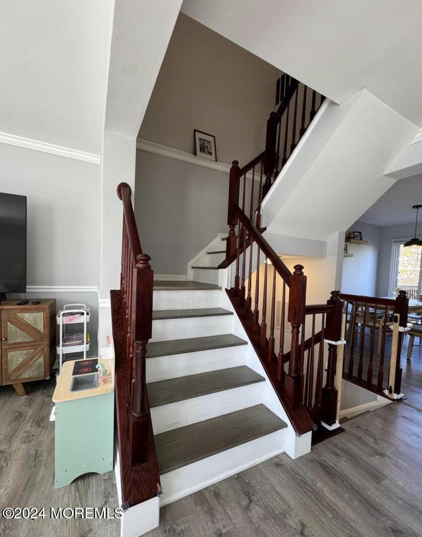 52 Saxton Road Farmingdale, NJ 07727 - Photo 33 of 52 a view of entryway and hall with wooden floor