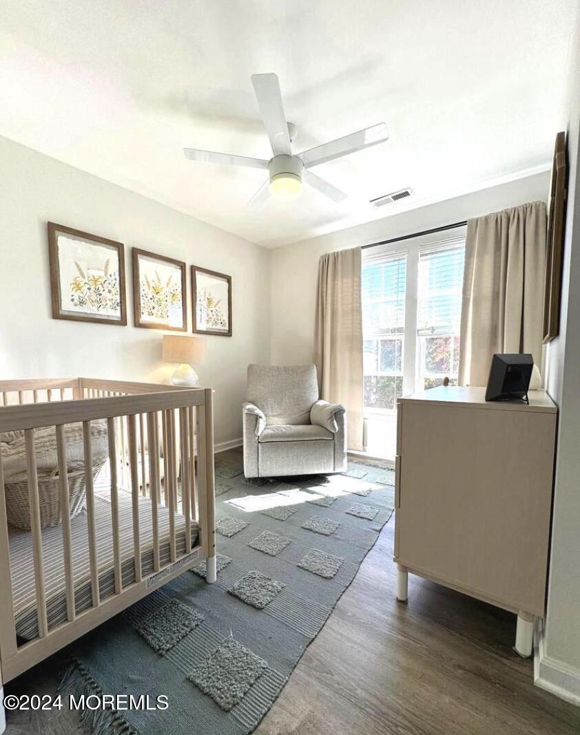52 Saxton Road Farmingdale, NJ 07727 - Photo 36 of 52 a living room with furniture and a large window