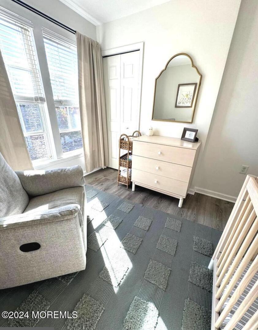 52 Saxton Road Farmingdale, NJ 07727 - Photo 37 of 52 a living room with furniture and a window