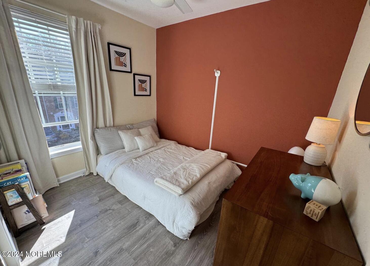 52 Saxton Road Farmingdale, NJ 07727 - Photo 40 of 52 a bedroom with a bed and a window