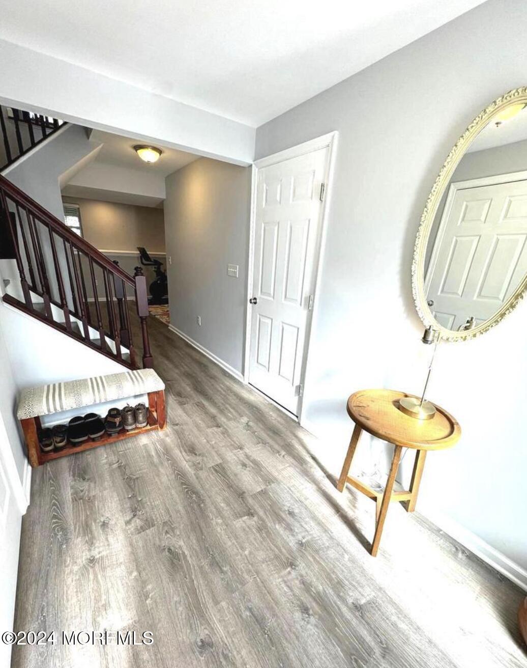 52 Saxton Road Farmingdale, NJ 07727 - Photo 4 of 52 a view of a room with gym equipment