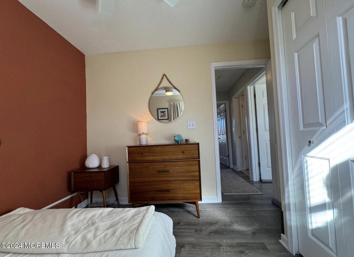 52 Saxton Road Farmingdale, NJ 07727 - Photo 42 of 52 a room with a dresser and a mirror