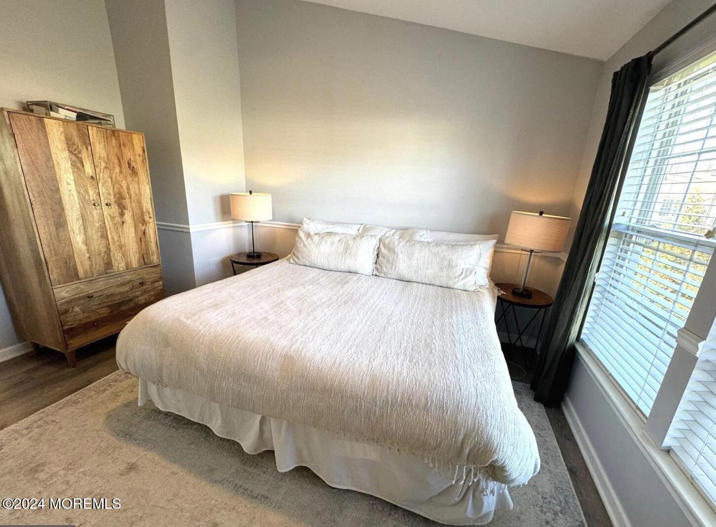 52 Saxton Road Farmingdale, NJ 07727 - Photo 46 of 52 a bed sitting in a bedroom next to a window