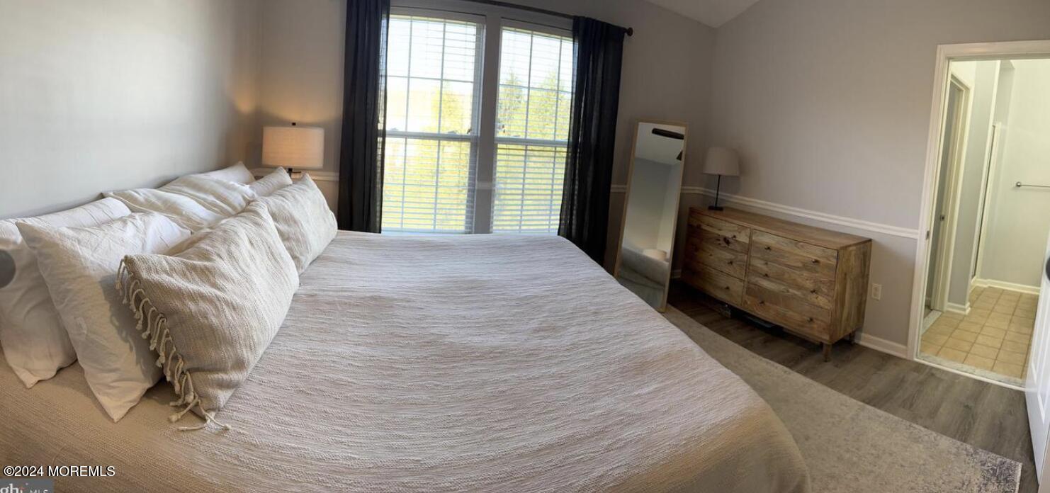 52 Saxton Road Farmingdale, NJ 07727 - Photo 47 of 52 a bedroom with a bed and a window