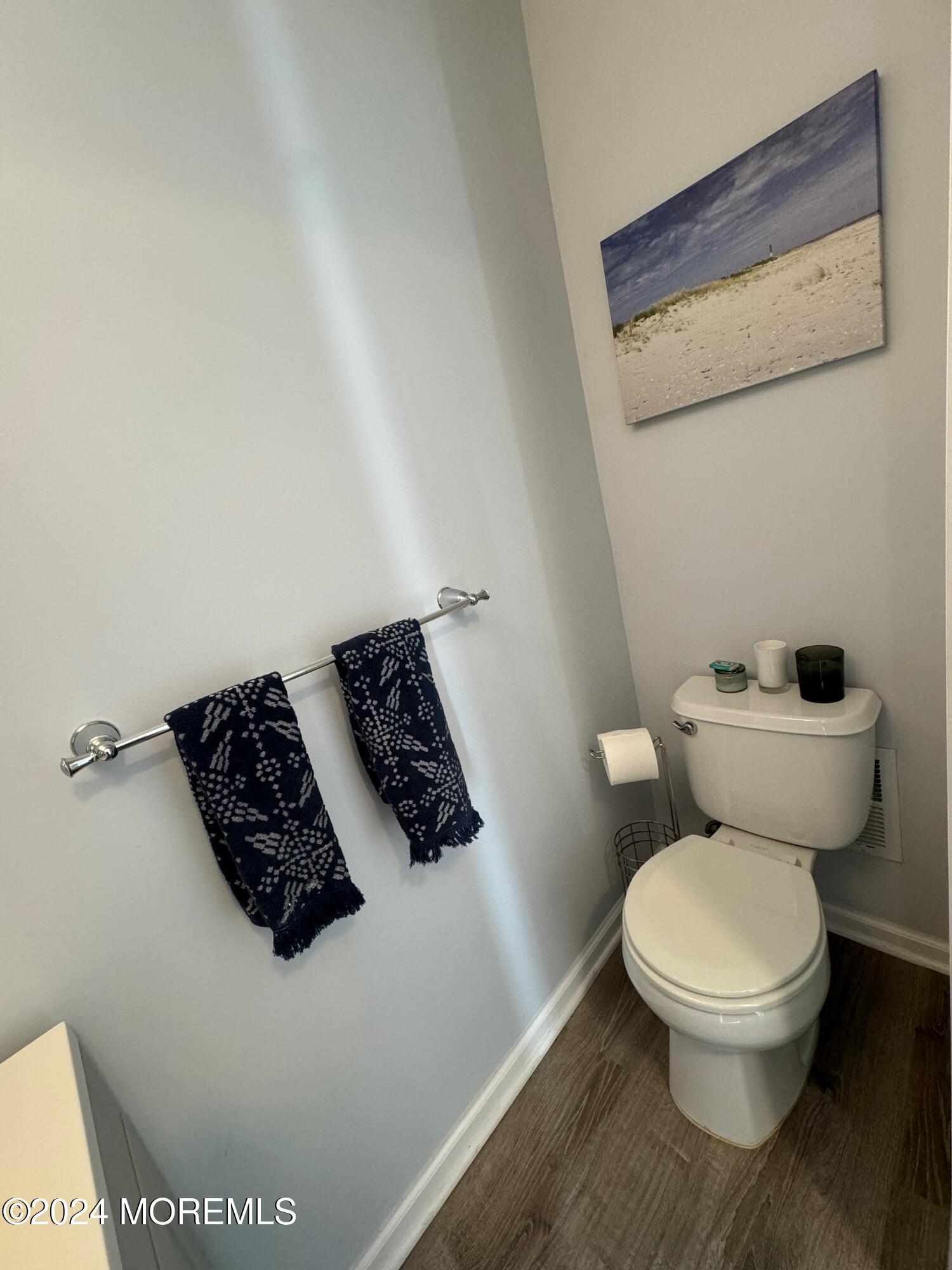 52 Saxton Road Farmingdale, NJ 07727 - Photo 7 of 52 a white toilet sitting next to a white sink