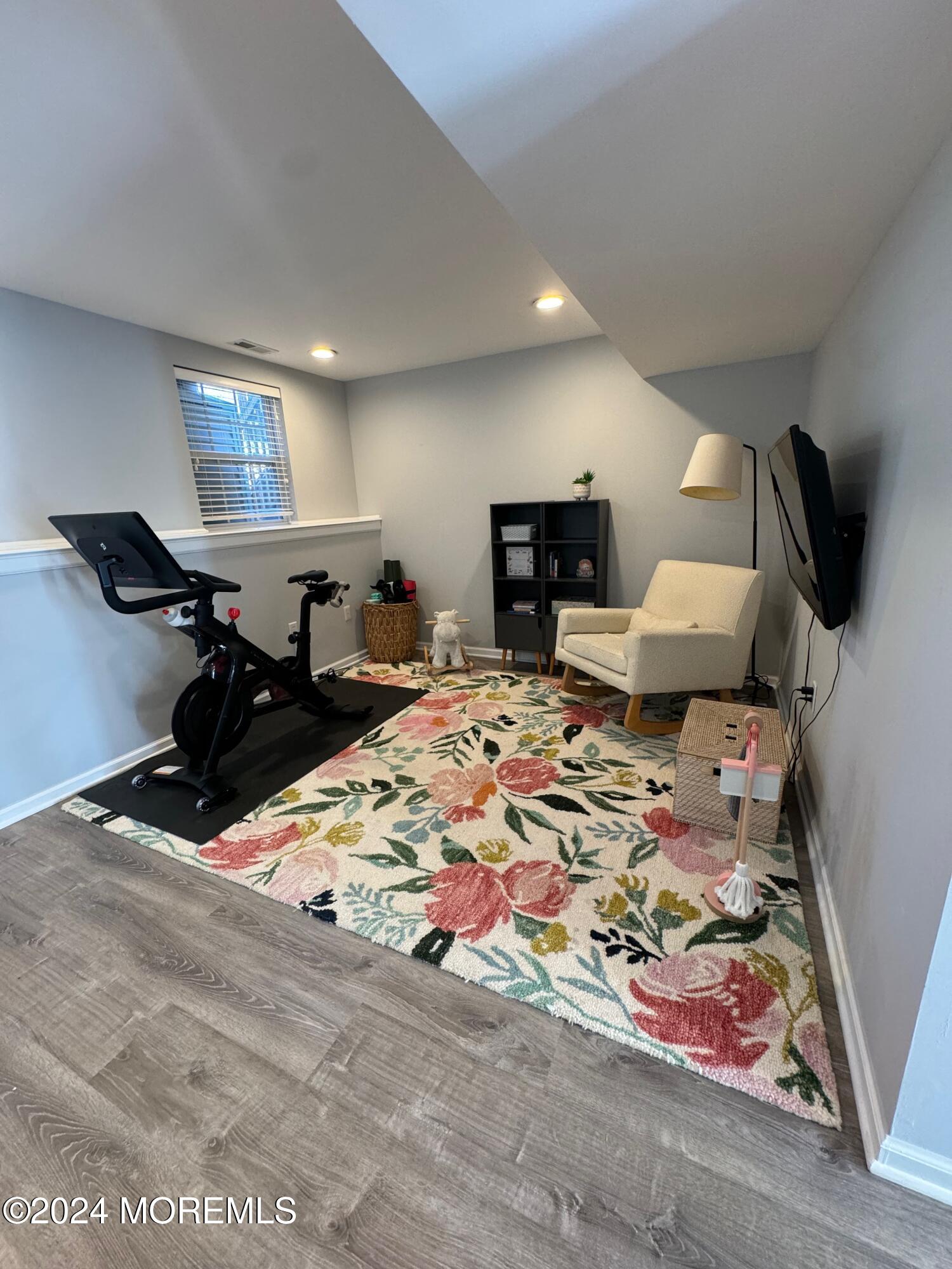 52 Saxton Road Farmingdale, NJ 07727 - Photo 10 of 52 a living room with furniture and a flat screen tv