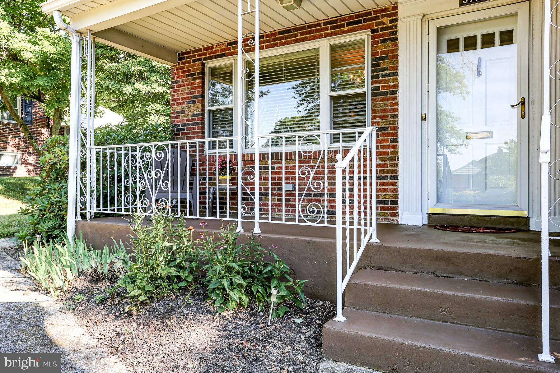 Covered front porch and entrance