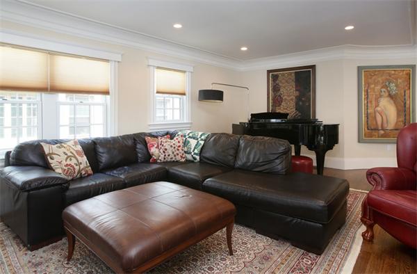 59 Green Street, Unit 1 Brookline, MA 02446 - Photo 5 of 7 a living room with furniture and a window