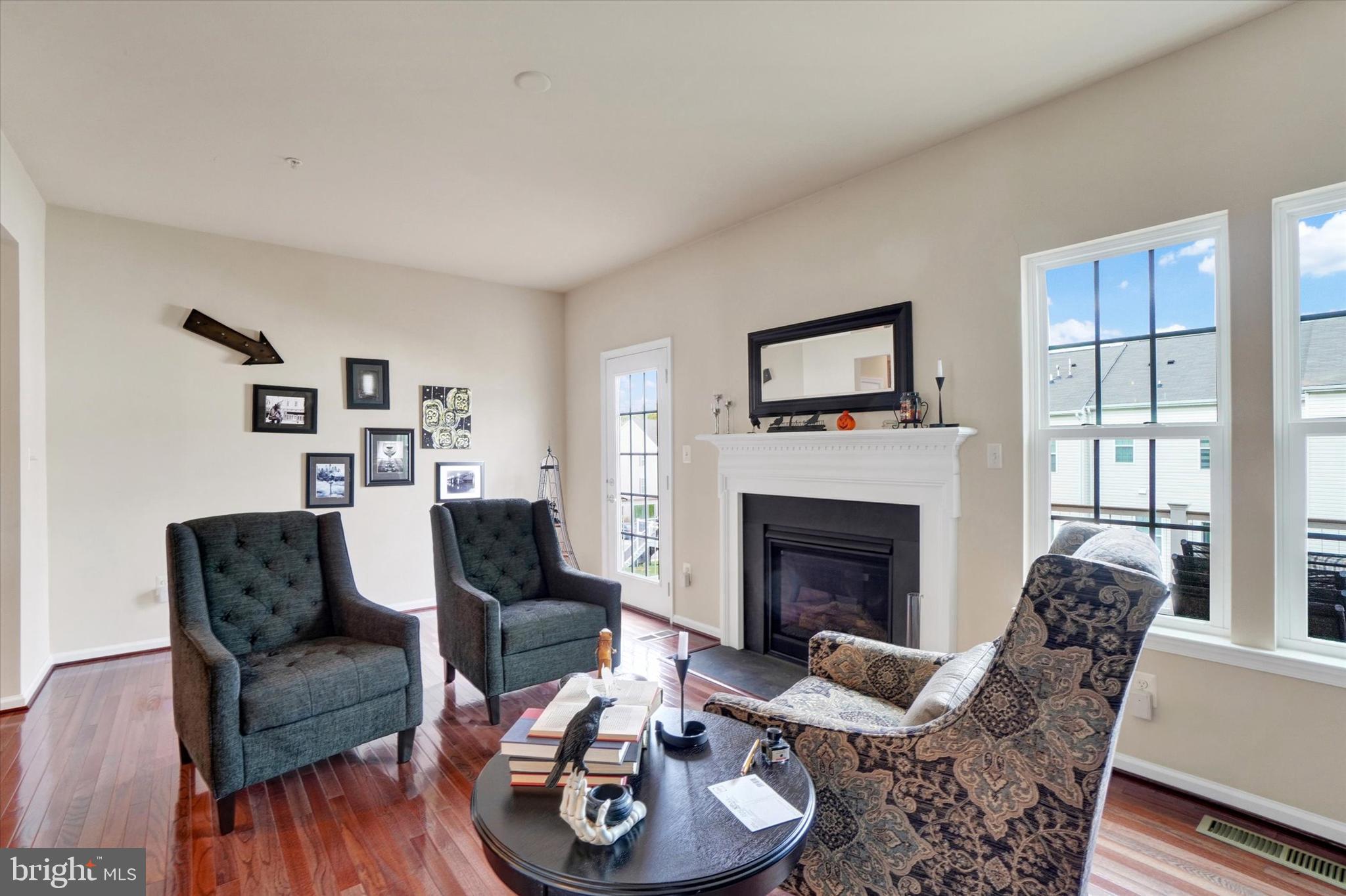 1269 Stonehaven Way, Unit 83 York, PA 17403 - Photo 12 of 28 a living room with furniture and a fireplace