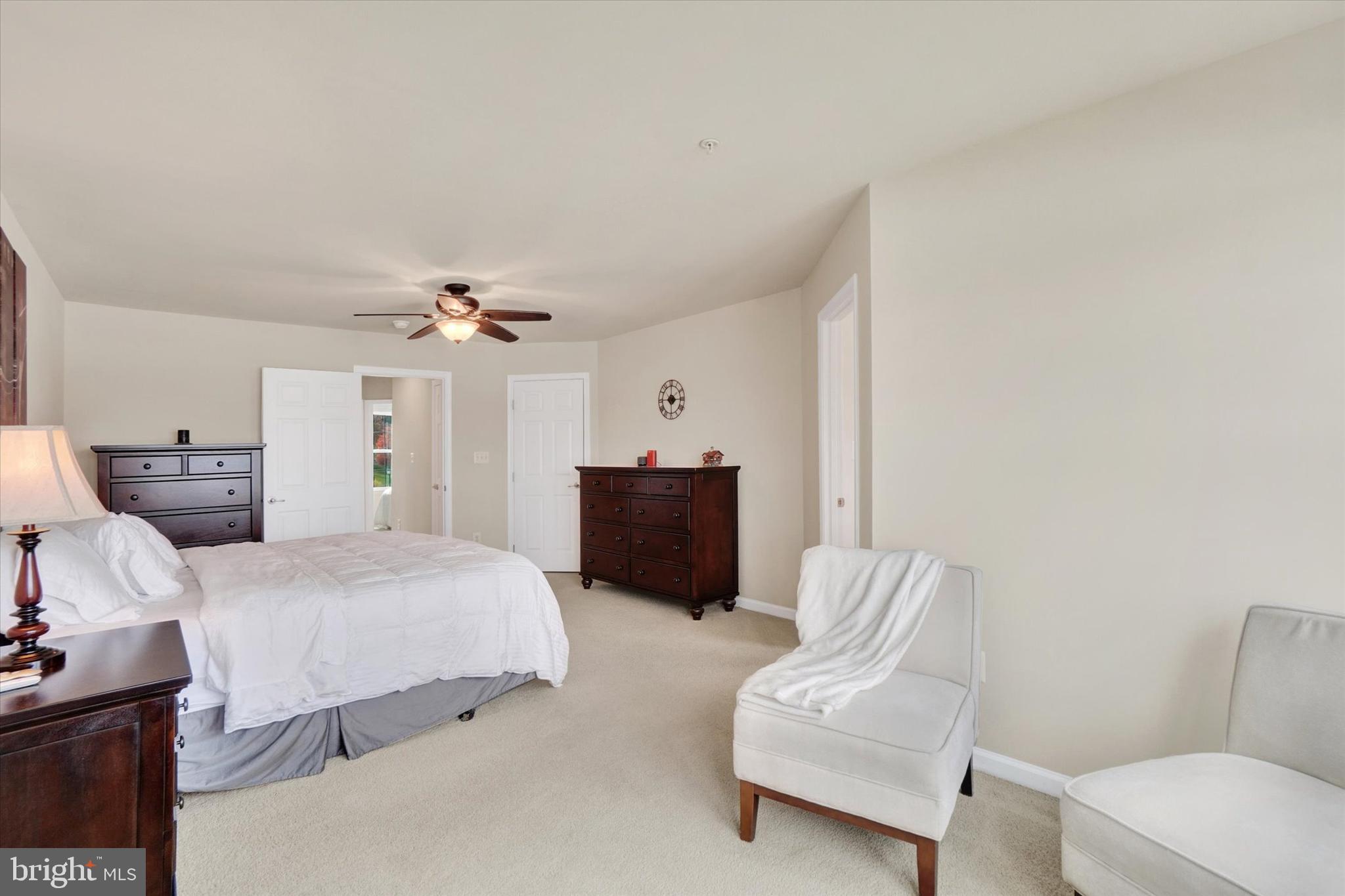 1269 Stonehaven Way, Unit 83 York, PA 17403 - Photo 21 of 28 a bedroom with a bed and a couch