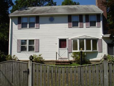 79 Harbor Hills Road Centerville, MA 02632 - Photo 2 of 7 a view of house with wooden fence and a porch