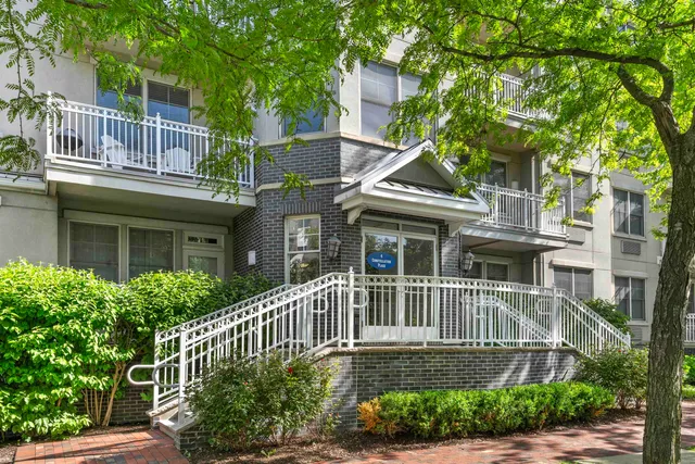 front view of a house with a small yard