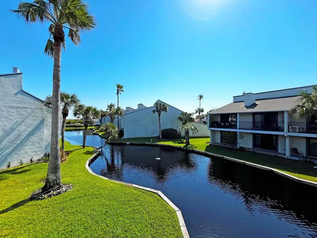 a swimming pool with yard barbeque oven and outdoor seating