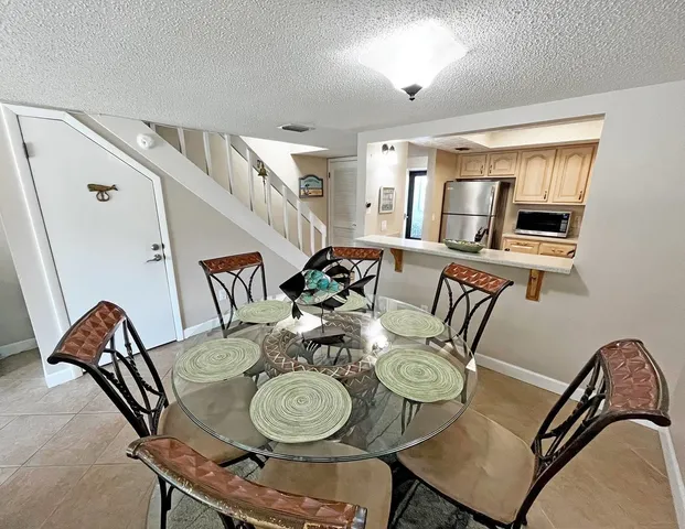 a view of a dining room with furniture