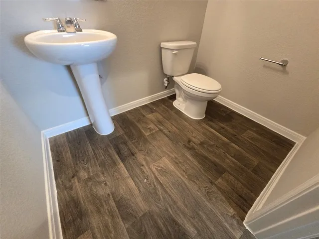 a view of a backyard of the house