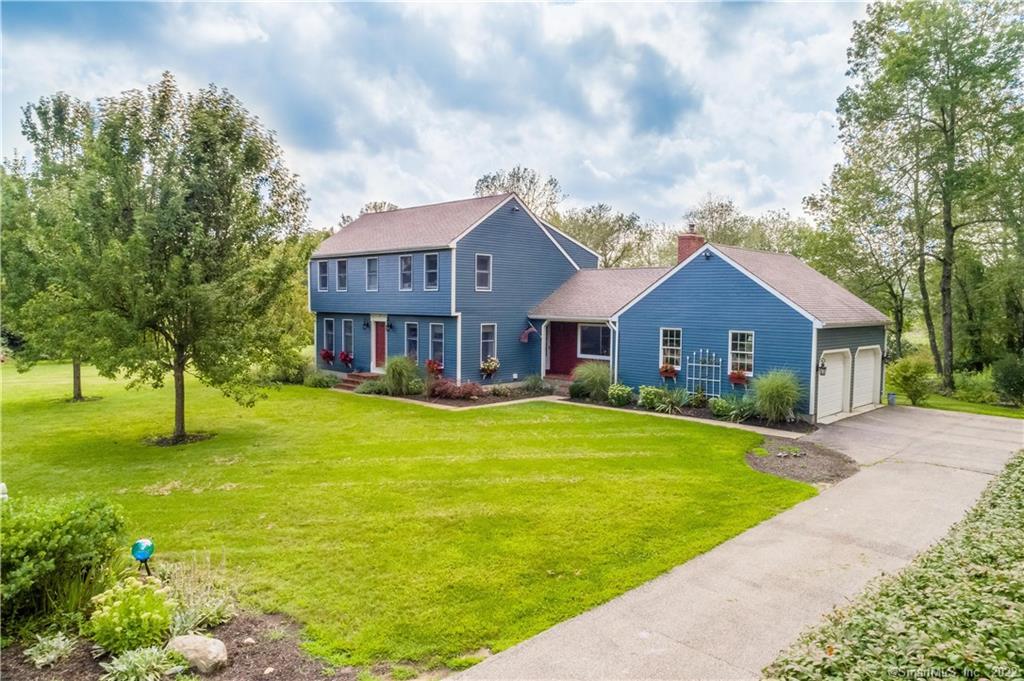 20 Weatherbee Road Pomfret, CT 06259 - Photo 1 of 1 a front view of a house with garden