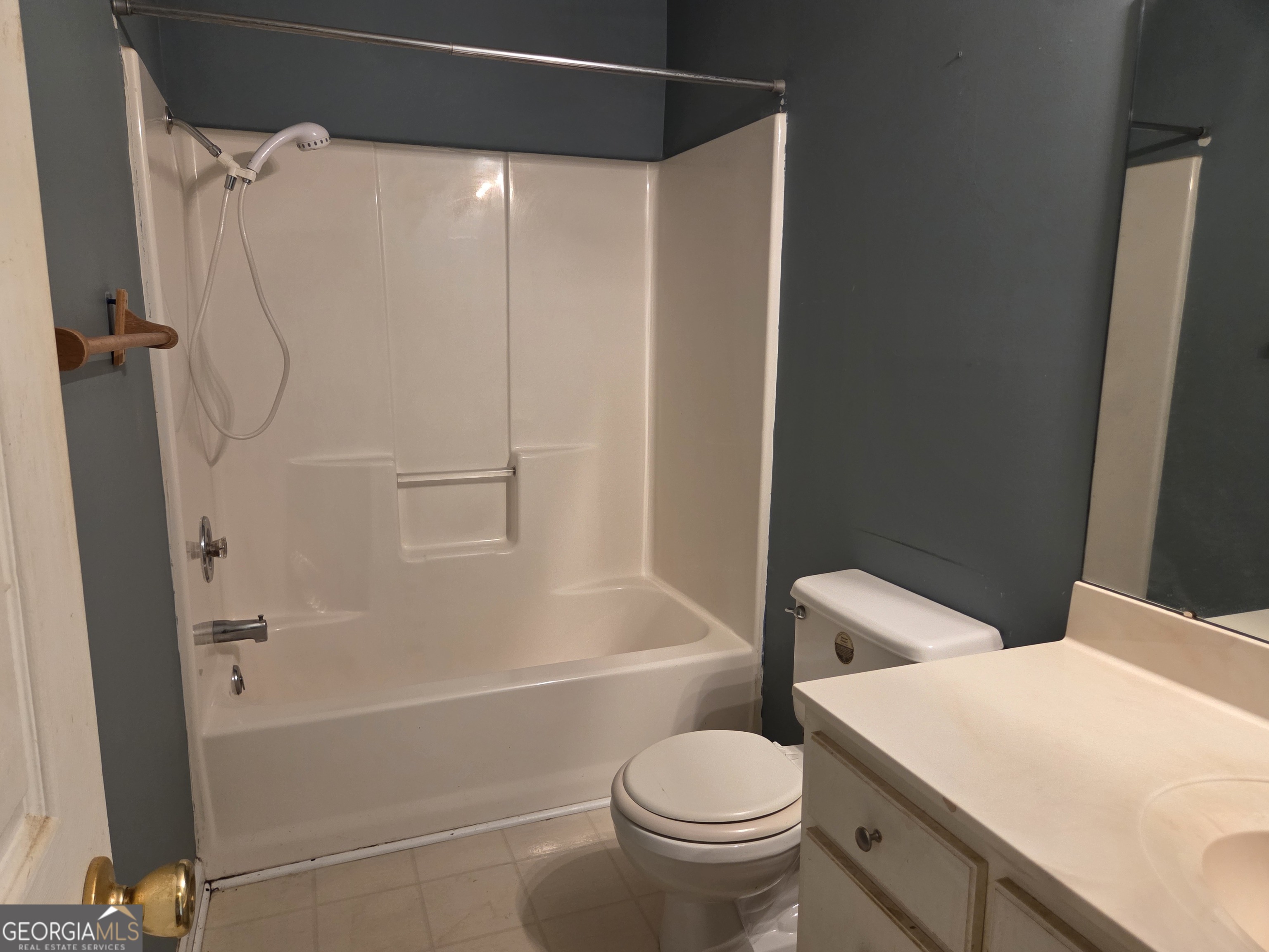 9546 Union Road Metter, GA 30439 - Photo 18 of 45 a bathroom with a sink a toilet and shower