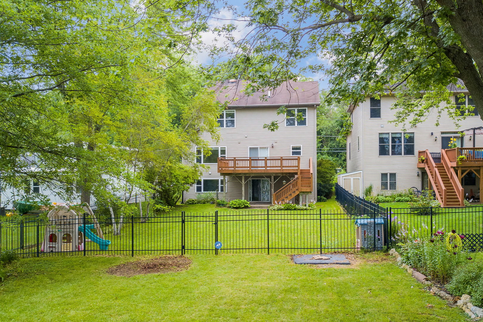 732 Robertson Road South Elgin, IL 60177 - Photo 28 of 37 a view of house with a backyard