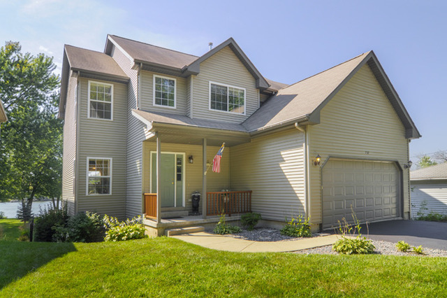 732 Robertson Road South Elgin, IL 60177 - Photo 37 of 37 a front view of a house with a yard