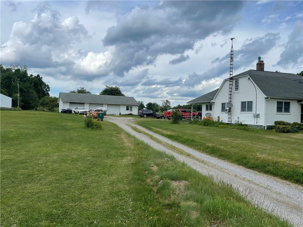 2459 Georgetown Road Sandy Lake, PA 16145 - Photo 1 of 1 a view of a house with a yard