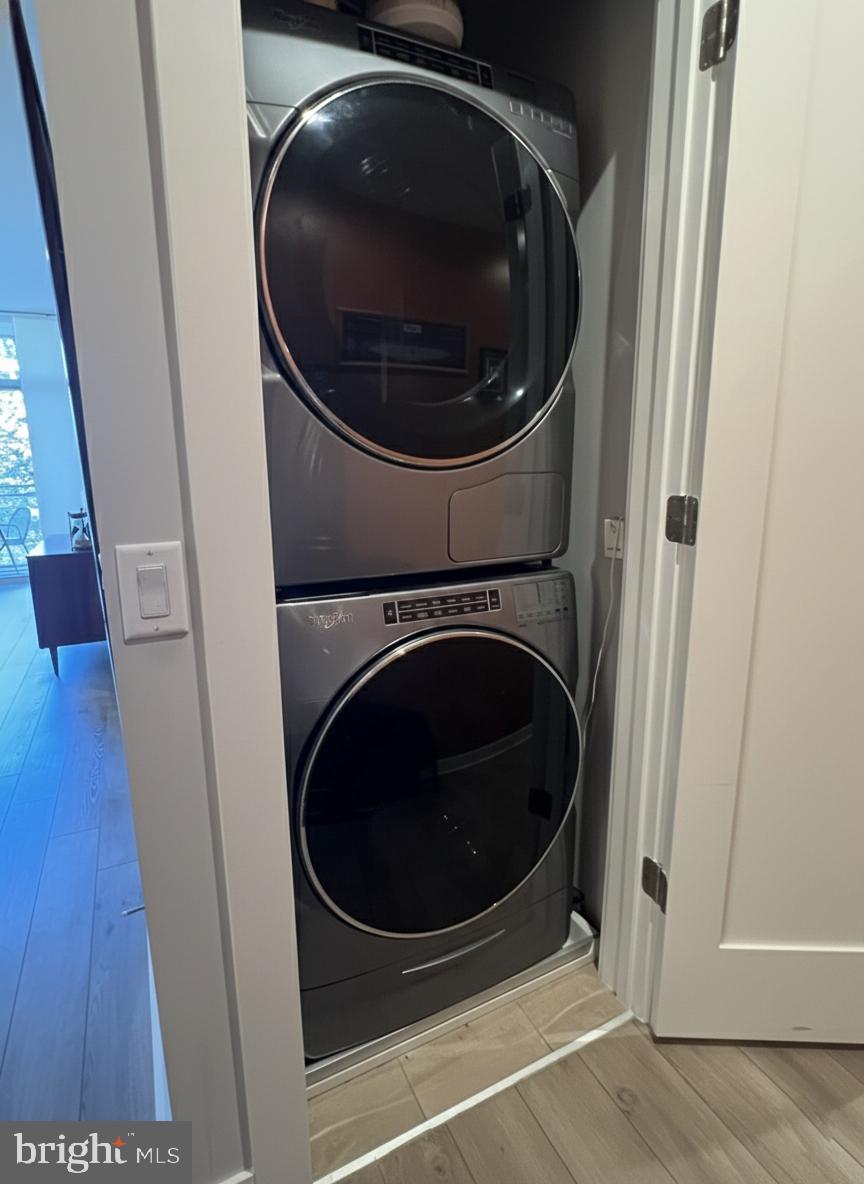 88 V Street Southwest, Unit 313 Washington, DC 20024 - Photo 15 of 38 a utility room with dryer and washer