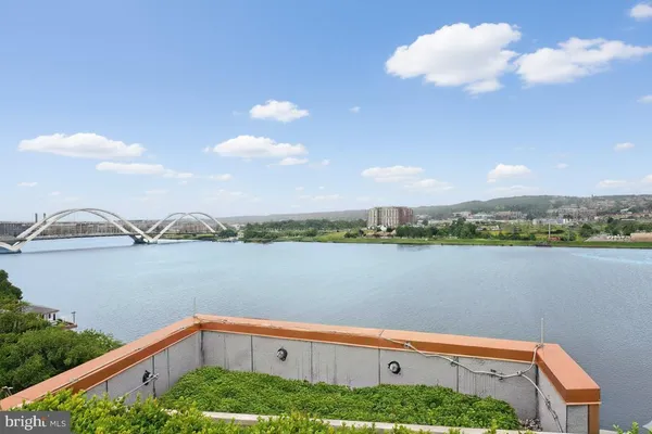 a view of lake with green space